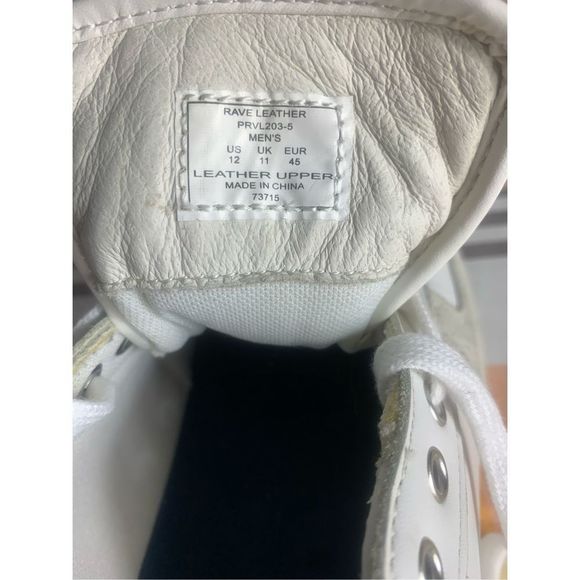 An original Penguin by Munsingwear white sneakers size 12